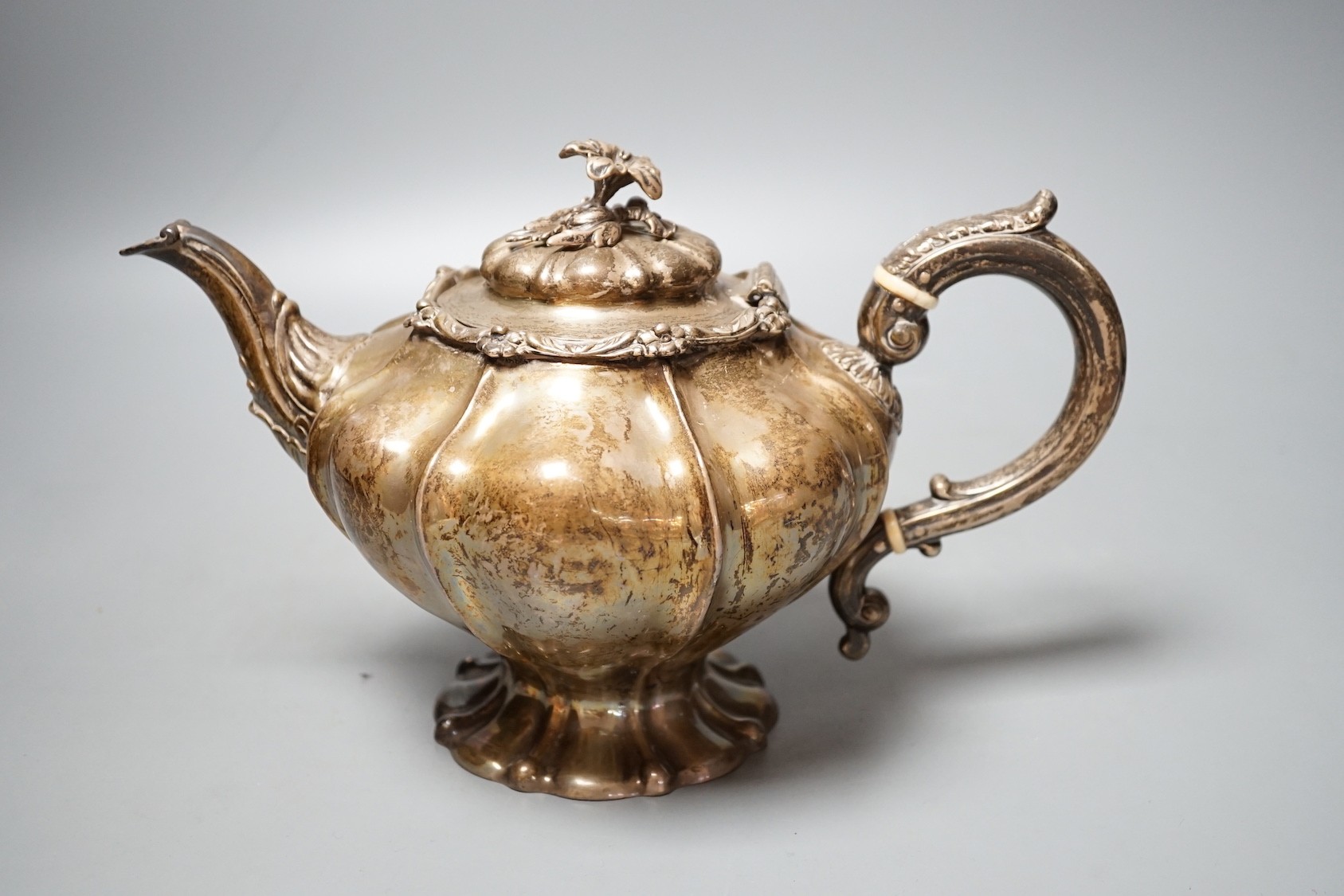 An early Victorian silver pedestal teapot by The Angells, London, 1840, 26.5oz.